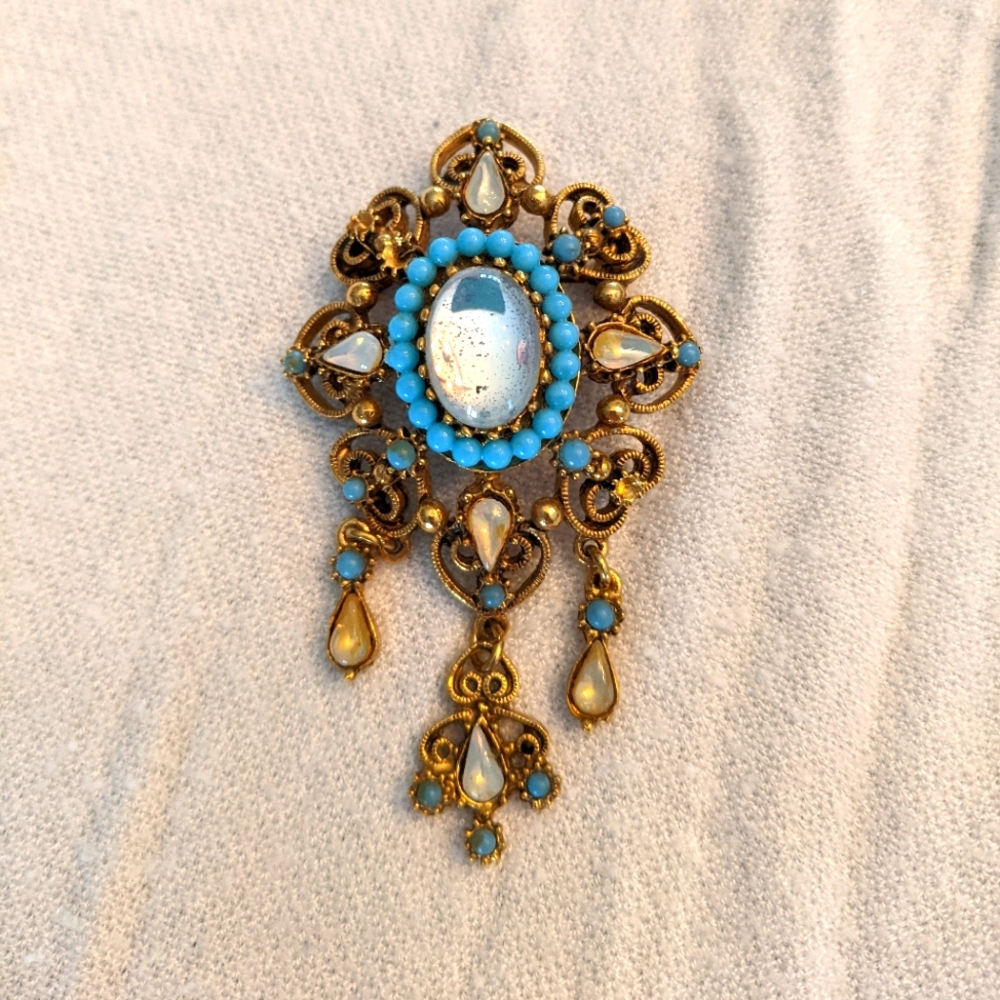 Turquoise and gold broach